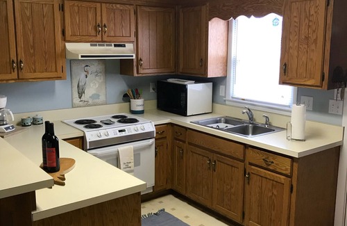 Sunset Beach House | Wonderful location, mid-island! Short walk to beach, pier and island market.