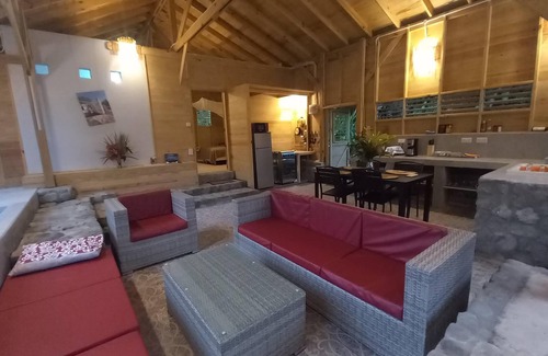 La Plaine House | Wood and stone bungalow with swimming pool