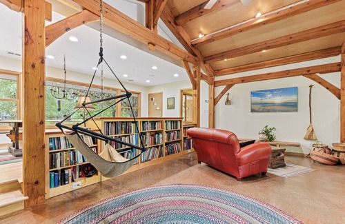 Plymouth House | Wooded lot with wildlife, indoor treehouse and screened porch: a family paradise