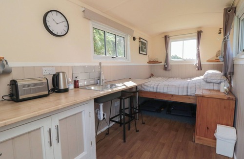 Scarborough Cottage | WOODPECKERS SHEPHERDS HUT, pet friendly, with a garden in Burniston