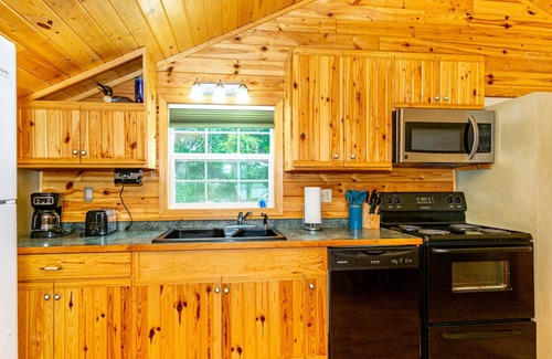 Park Rapids Cabin | WRC 6 Lake front, sandy beach, great fishing, water skiing, tubing and more!