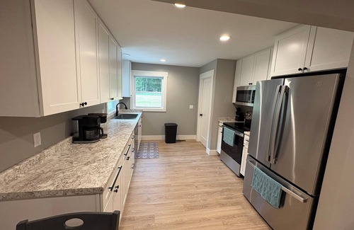 Lake City House | Year-round 3BR/2BA trailside house & 4 electric campsites near Lake Missaukee