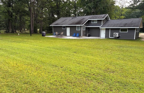 Lake City House | Year-round 3BR/2BA trailside house & 4 electric campsites near Lake Missaukee