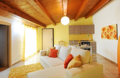 Caucana-finaiti-casuzze-finaiti Nord Apartment | Yellow attic at Cocorito Apartments