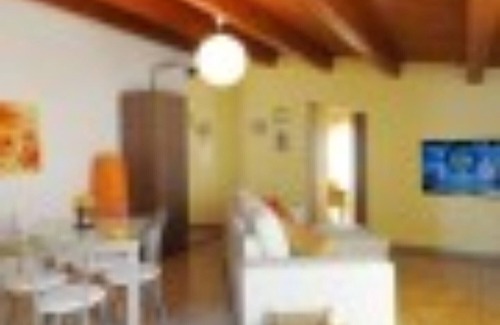 Caucana-finaiti-casuzze-finaiti Nord Apartment | Yellow attic at Cocorito Apartments