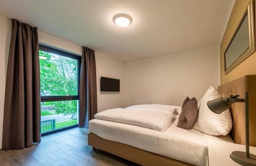 Krakow am See Apartment | Yogasutra - Stilvolles 3-Zimmer-Apartment mit Seeblick, Balkon & Sauna