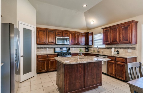 Edmond House | Your Oasis of Calm: Where Family Chaos Meets Cozy!