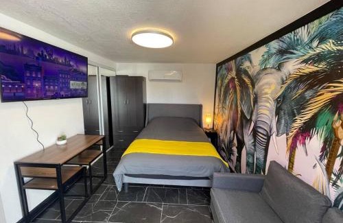 Garfield Apartment | Your Tiny Downtown Home with Backyard Unit D