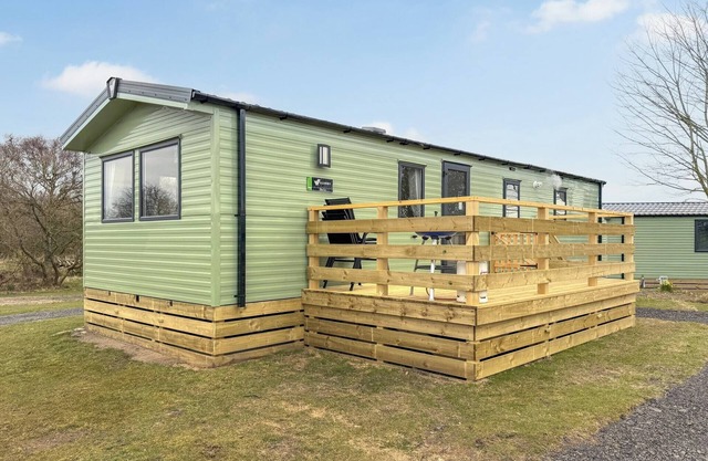 12ft-wide caravan situated in a coastal position.