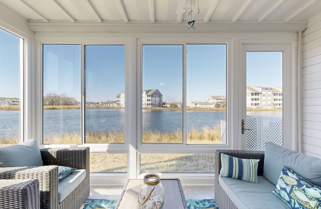 1st-floor Bethany Bay condo with bay views & on-site golf/pool/tennis
