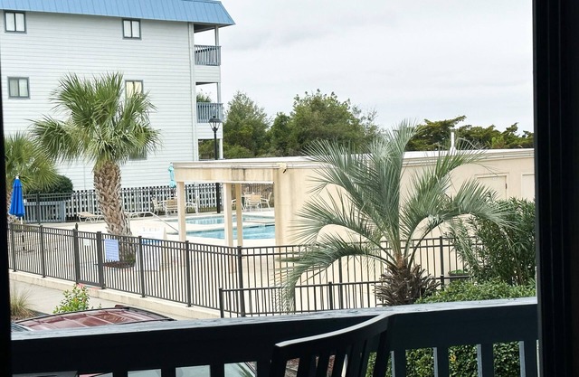 1st floor. Just steps to pool and beach access!