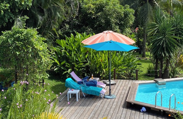 2-bedroom villa in a quiet garden with trees and flowers