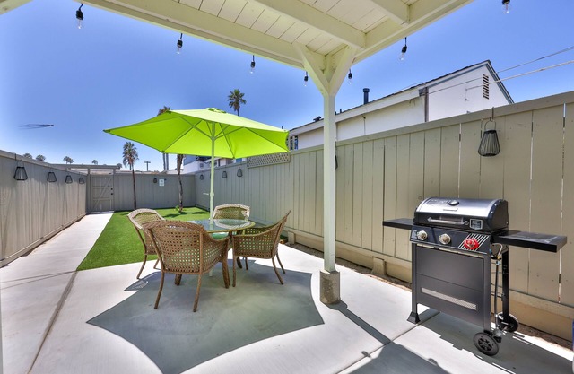 2 BEDROOM WITH LARGE YARD - LITERALLY STEPS TO THE SAND