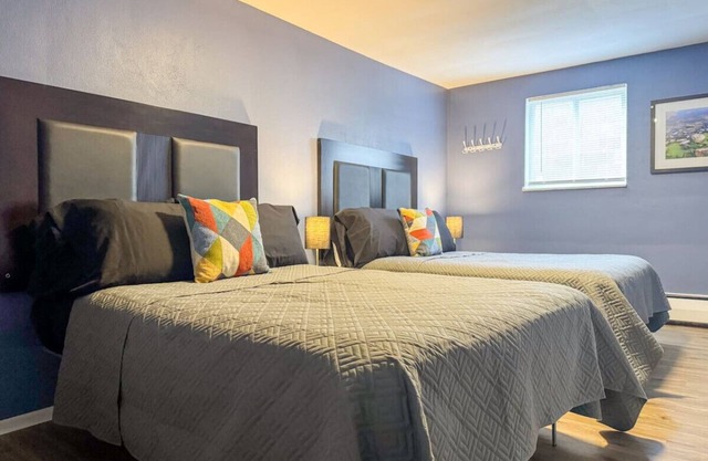 2 Full Apartments, 4 Bedrooms, 12 Beds + Parking