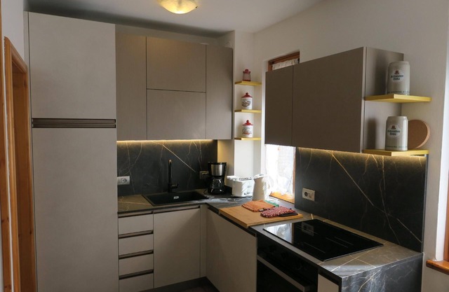 2-level flat with private garden area