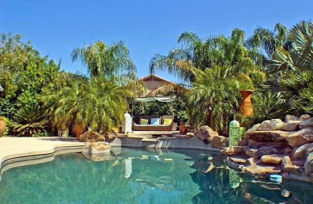 20+ PALM TREES + POOL + SPA + WATERFALL = PRIVATE RETREAT!