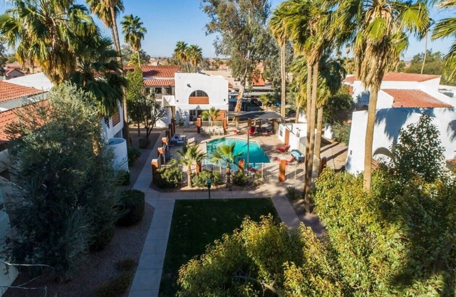 34B- Modern studio condo heated pool and dog park