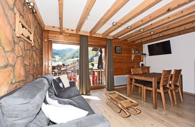 350m from the ski lifts, parking, in the village of La Clusaz
