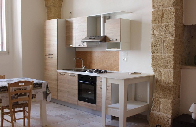 4 apartments with garden in the historic center with parking a few minutes d