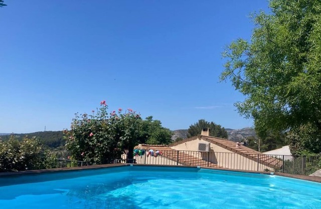 4-bedroom house perched on a hill with its own comfortable garden and swimming pool