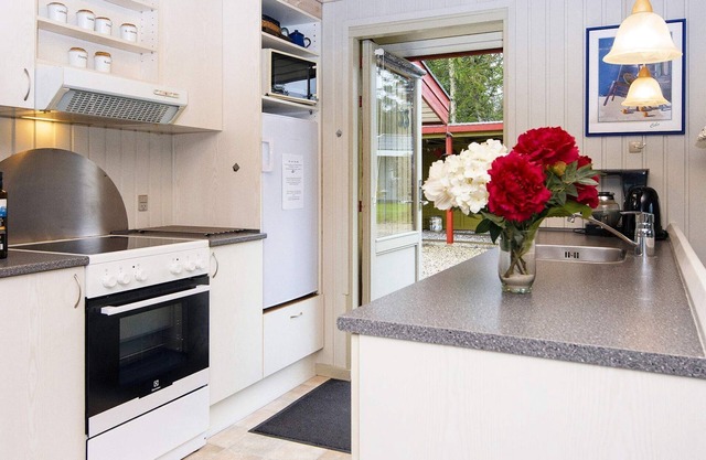 4 person holiday home in Fårvang