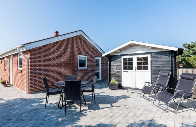 4 person holiday home in Henne