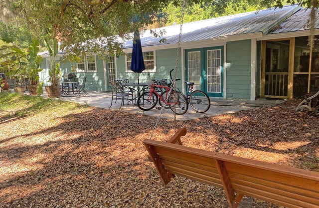 A comfortable home in a quiet neighborhood graced with Spanish Moss draped oaks.