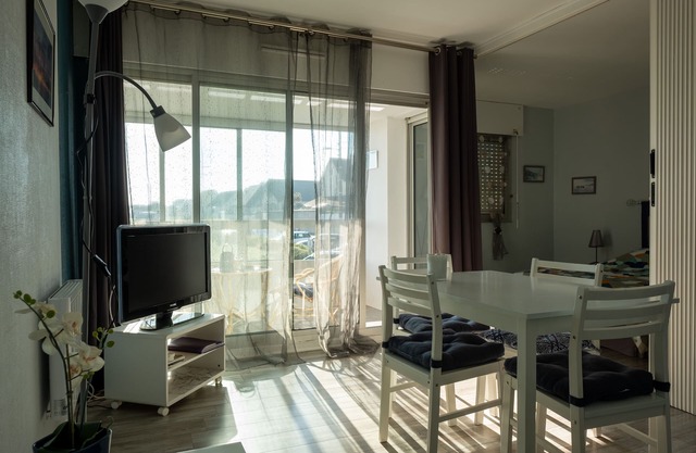 A large bright F2 apartment overlooking the sea and the landing beach