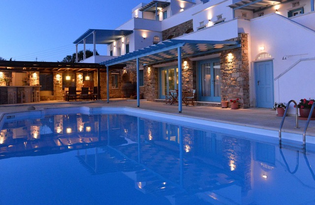 a magnificent villa in a Mediterranean garden, with shared swimming pool
