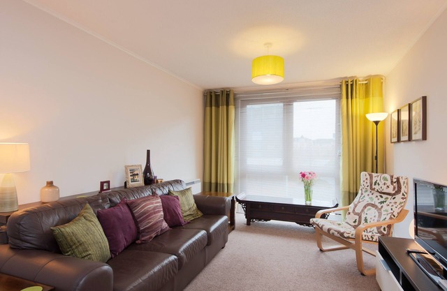 A modern 2-bedroom apartment in a quiet neighbourhood . Sleeps 4