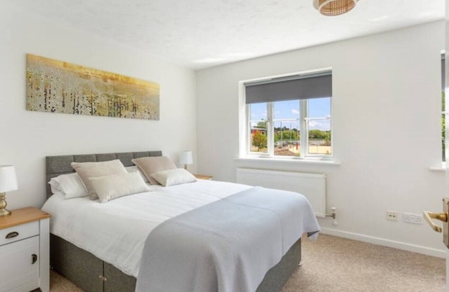 A modern, bright and clean home, in prime location with private parking!