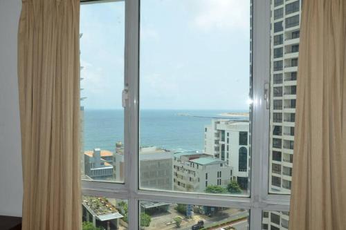 A Monarch Serviced Aircon 2bed 2bath living & Kitchen near new Serviced Apartment Col 3