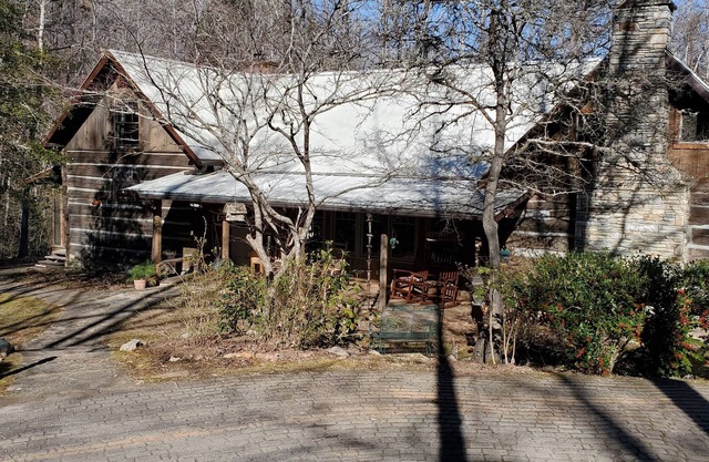 A rare gem with pioneer spirit, modern amenities, river, creeks, acres of woods