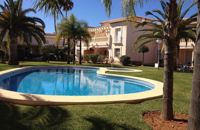 A Townhouse in a Small Private Development with Shared Pool and Gardens.