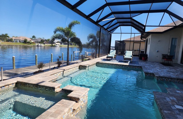 A100+ REVIEW WATERFRONT LUXURY HOME w/HEATED POOL&SPA/GULF ACCESS/CLOSE TO BEACH