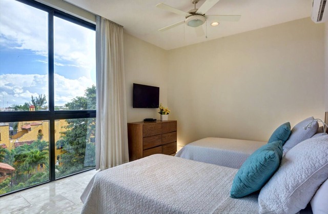 Affordable 2 Bedroom, Rooftop Pool, Balcony, Security, Garage, Smart TV 407n