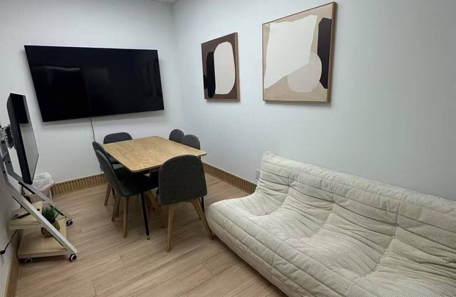 Affordable Cozy Central Location Studio with Futon, 55' TV, Complementary Coffee