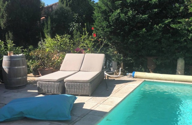 Air-conditioned town house with heated swimming pool