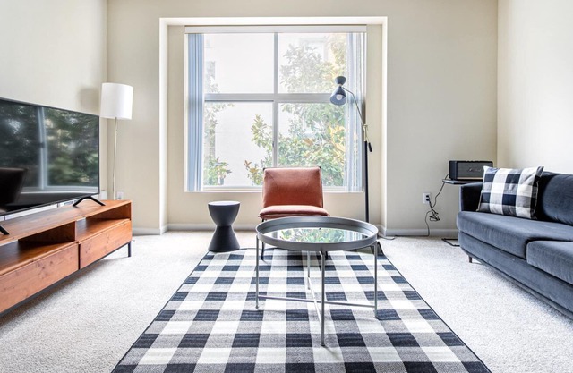 Airy South SF 1BR w/ W/D, Gym, Pool, next to BART and TJ, by Blueground