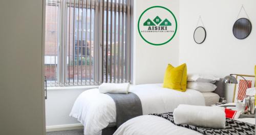 Aisiki Living at Upton Road, Multiple 1, 2, or 3-Bedroom Apartments, King or Twin Beds with Free Wi-Fi and Parking Space