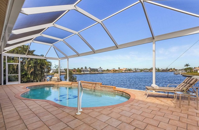 Amazing sunsets, Fishing from the dock, Large lanai & Pool - Villa Boa Vista - Roelens Vacations