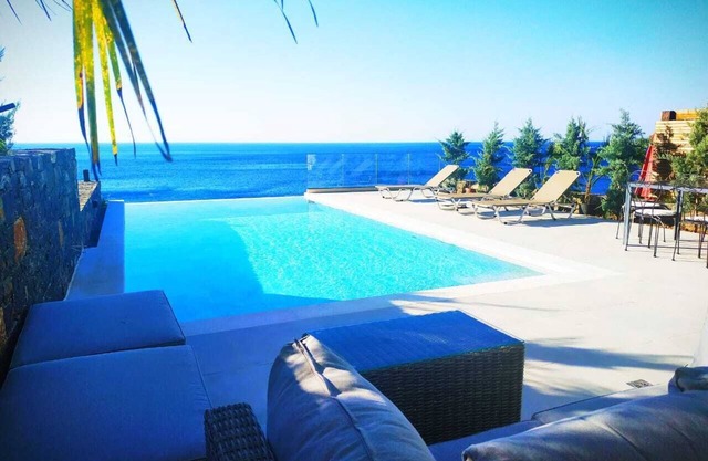 An exquisite and luminous seaside villa. The epitome of coastal serenity.