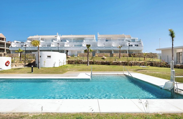 Apartment 'Bajo Poniente' with Sea View, Shared Pool and Wi-Fi