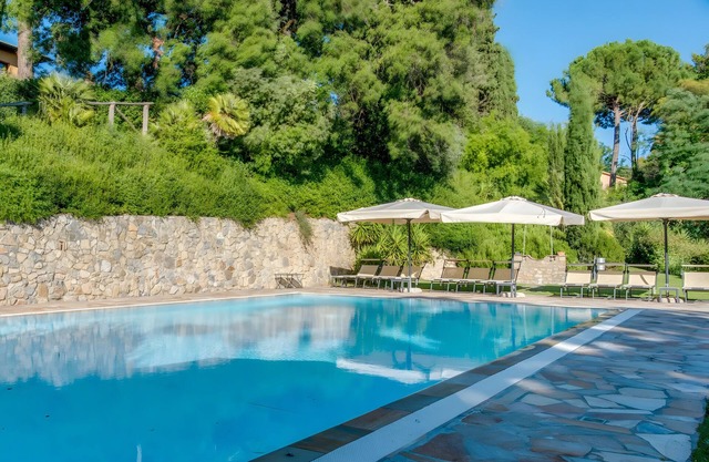 Apartment 'Le Tre Civette' with Shared Pool, Private Garden and Wi-Fi