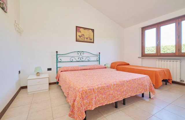Apartment "Mare Etrusco Villetta D1" with Private Garden & Wi-Fi