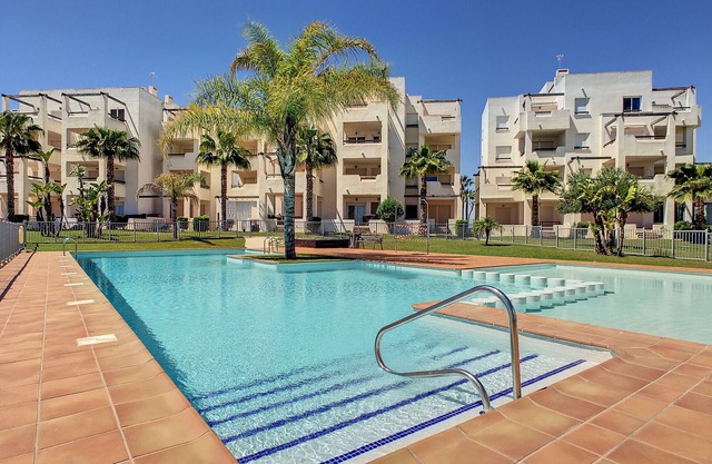 Apartment with pool and golf views