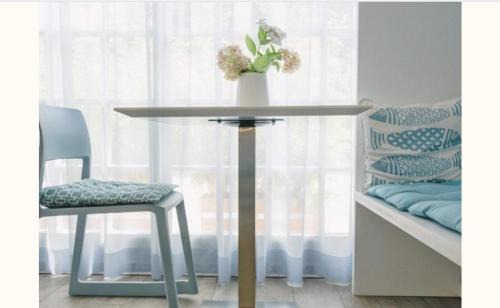 Appartement avec lit double et cuisine équipée