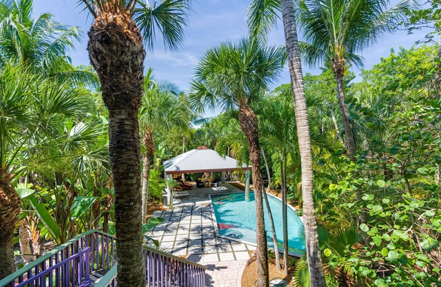 Architecturally stunning, home with the feel of a Balinese resort. Ready for guests post Ian