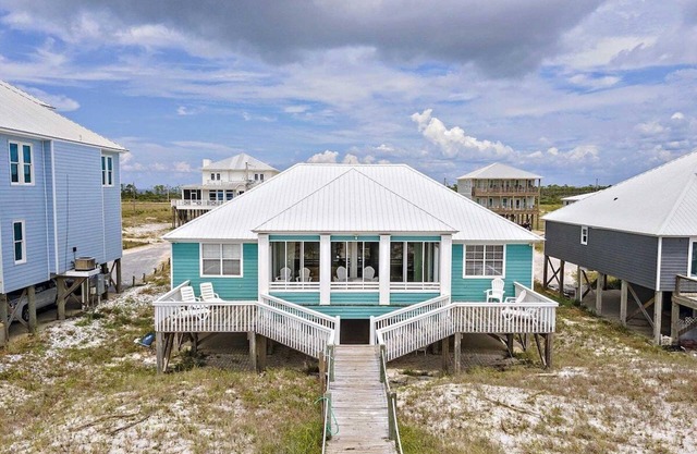 Baird's Blue Dolphin, a 4 bedroom 4 bath beachfront house with stunning views by Prickett Properties