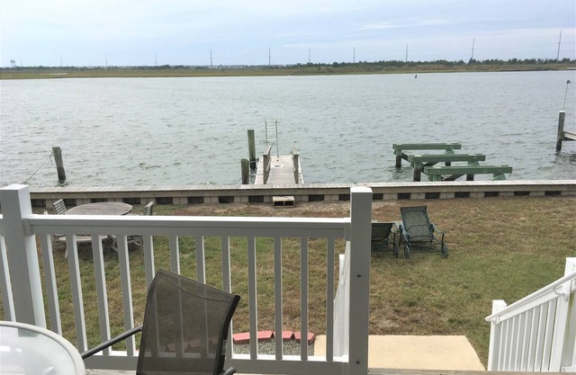 Bay-Front single family home that features expansive Intracoastal waterway views with easy Townsend inlet access